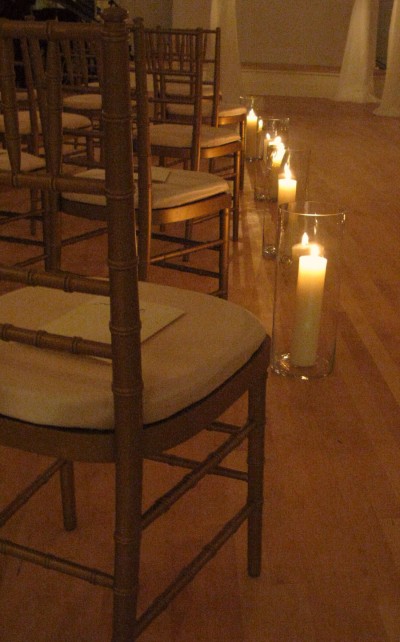 aisle lined with candles