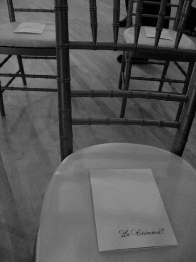 wedding program on chair