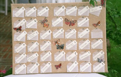 vellum-escort-card-envelopes-corkboard vellum-escort-card-envelopes-corkboard