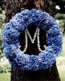 monogram-letter-inside-blue-wreath-on-tree monogram-letter-inside-blue-wreath-on-tree