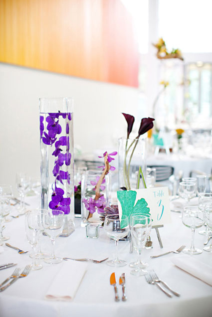 submerged flower centerpieces. Multicolored Modern Wedding at