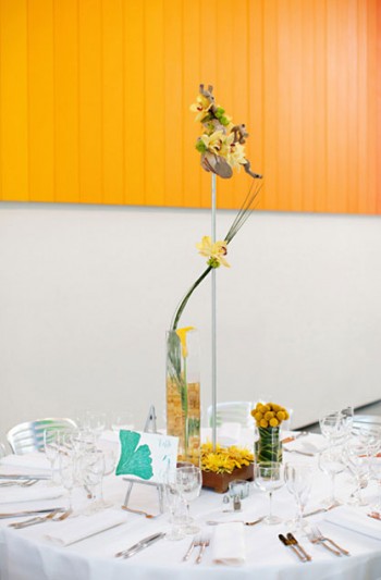 modern-orange-yellow-centerpieces-varying-heights