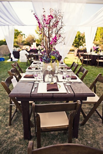 brown-wood-estate-tables-tall-purple-branch-centerpieces