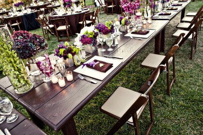 green-submerged-flower-centerpieces-estate-tables-varying-height-flowers