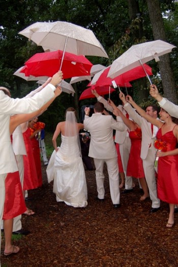 ceremony-exit-under-umbrellas ceremony-exit-under-umbrellas
