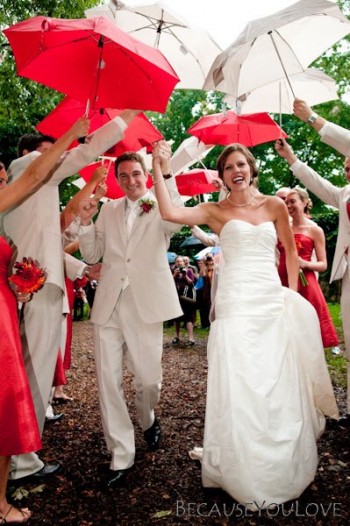 exiting-ceremony-under-red-and-white-umbrellas exiting-ceremony-under-red-and-white-umbrellas