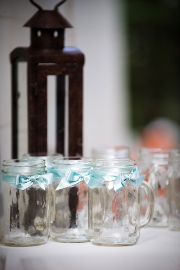 mason-jars-tied-with-blue-ribbons