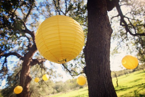 yellow-paper-lanterns-hung-from-trees yellow-paper-lanterns-hung-from-trees