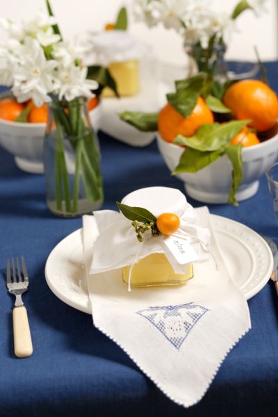  table with fruit centerpieces and accompanied the citrus tablescape with 