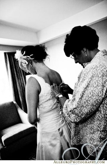 bride-putting-on-gown bride-putting-on-gown