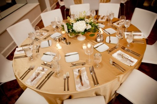 Gold linens wedding gold linens White Centerpieces Gold Linens 500x333