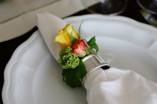 Fresh Flowers Tucked into Napkin Ring