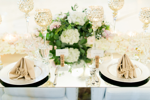 Ivory and Green Centerpiece on Mirror Table Ivory and Green Centerpiece on Mirror Table