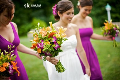 purple-bridesmaids-dresses-orange-bouquets