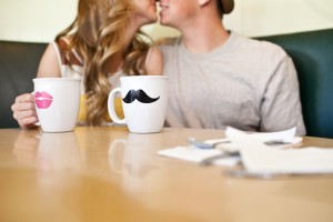 Couple in Diner With Whimsical Coffee Mugs