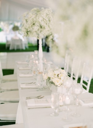 White Reception Table With Babys Breath and Roses