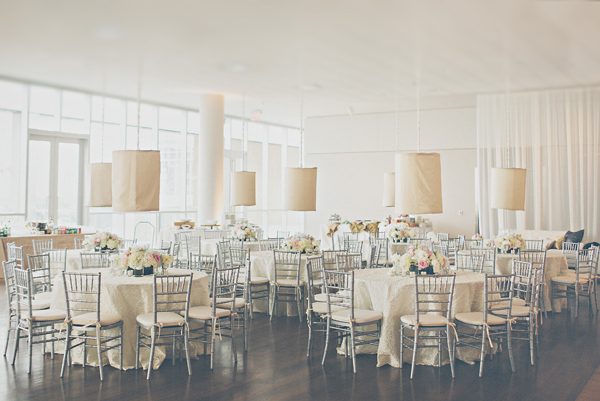 Round Reception Tables With Fabric Lanterns and Gray Bamboo Chairs 1