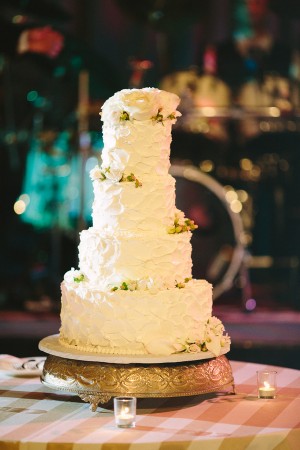 Four Tier Round Textured Wedding Cake With Roses