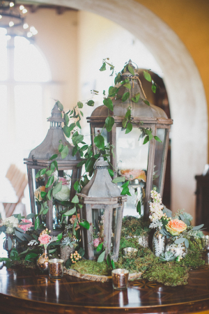 Vintage Lantern Display With Moss and Flowers