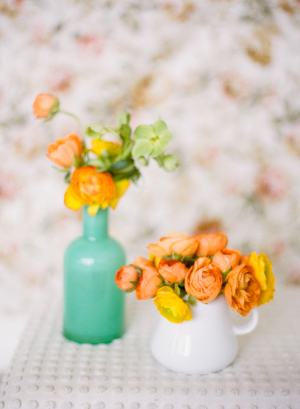 Citrus Colored Flowers in Milk Glass Vases