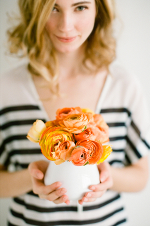 Orange Flowers in White Vase