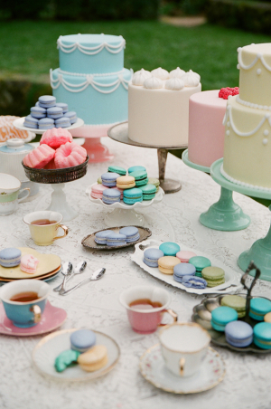 Pastel Colored Cakes and Macaroons Dessert Table