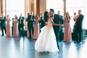 Bride and Groom Kissing During First Dance