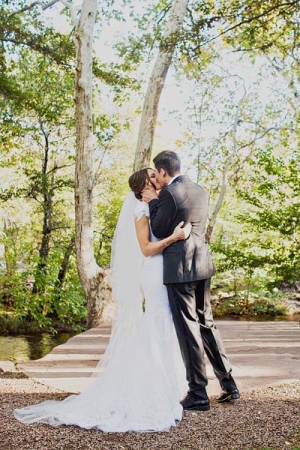 Bride and Groom Kissing Outdoors From Sloan Photographers