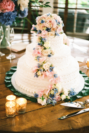 Wedding Cake with Blue and Pink Flowers