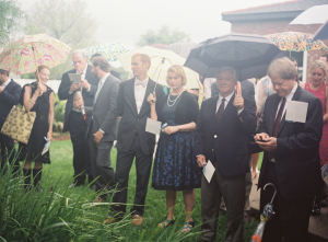 Wedding Guests with Umbrellas