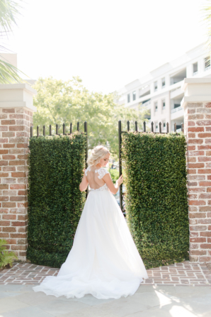 Bride at Gate with ivy